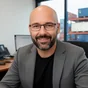 Portraitfoto von Michael Schürger, Speditionsleiter, Global Logistics - Kundenstimme zu lkw-fahrer-finden.de